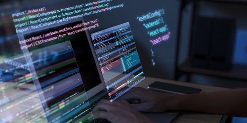 programming-background-with-person-working-with-codes-computer